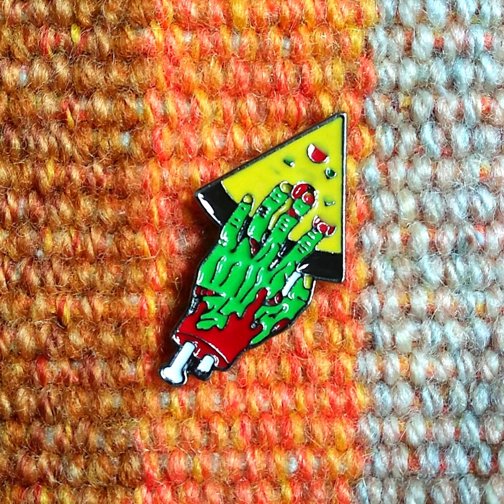 Zombie hand w/ pizza enamel pin